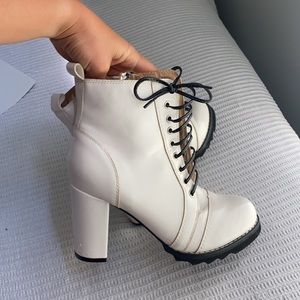 White heeled lace up boots